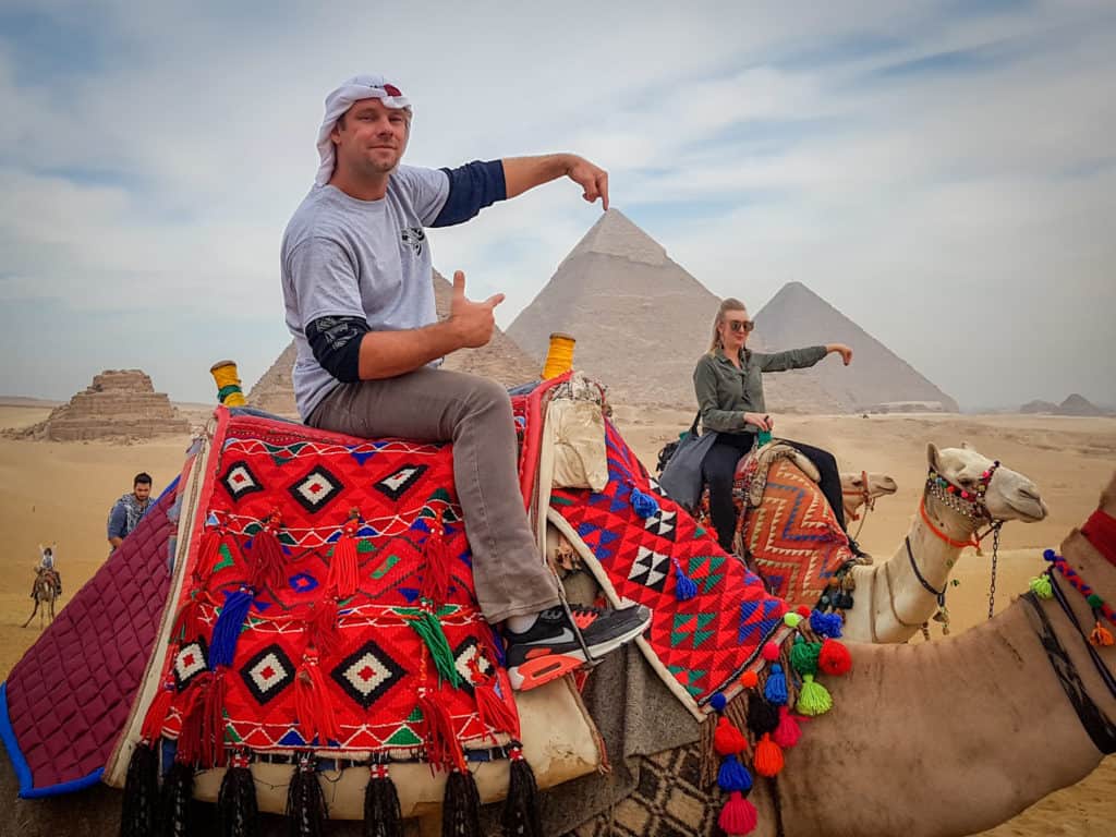 BTS cheesy pose on camel back Pyramids of Giza