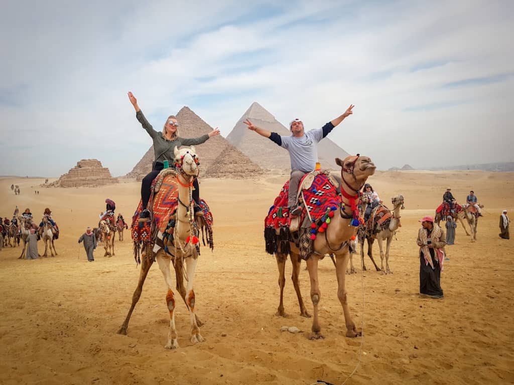 Seeing pyramids of giza on the back of a camel