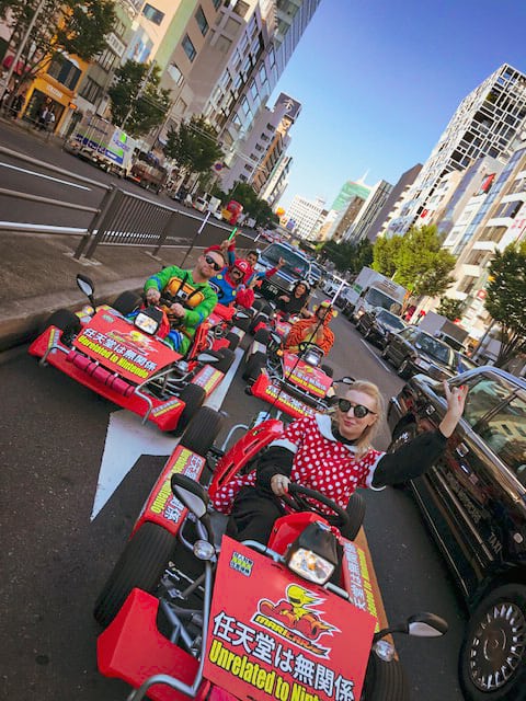 Driving go karts through the streets of Tokyo, while dressed in costumes